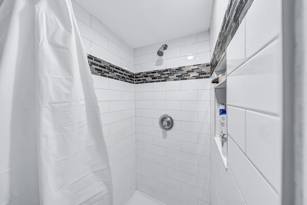 30 Fuller Street Seekonk, MA 02771 - Photo 32 of 42 a bathroom with a shower