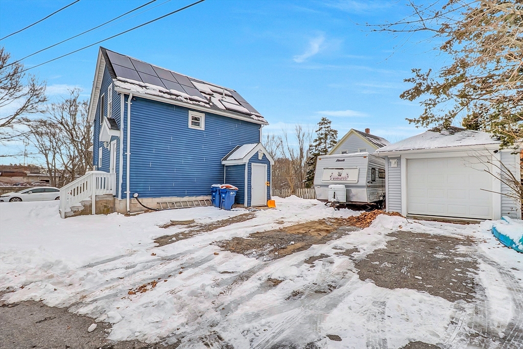 30 Fuller Street Seekonk, MA 02771 - Photo 39 of 42 a front view of a house with a snow in the yard