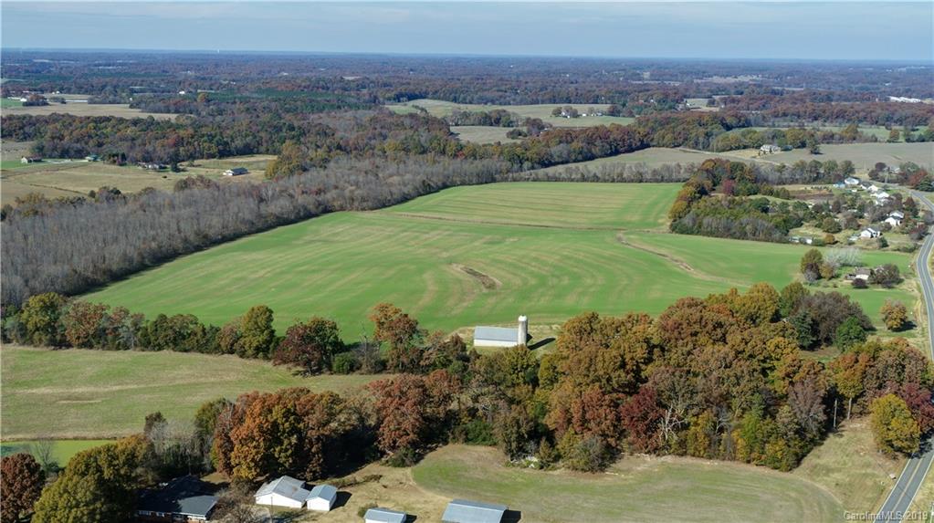 1221 A McIntyre Road Wingate, NC 28174 - Photo 2 of 25 a view of a grassy area with an ocean