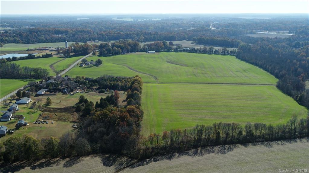 1221 A McIntyre Road Wingate, NC 28174 - Photo 11 of 25 a view of a field with an outdoor space