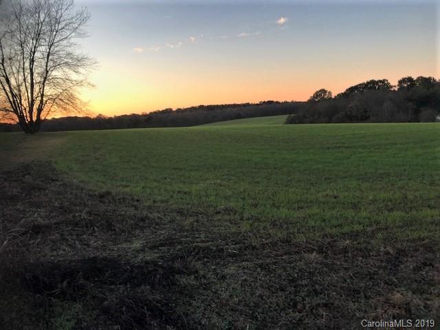 1221 A McIntyre Road Wingate, NC 28174 - Photo 15 of 25 a view of a field with an ocean
