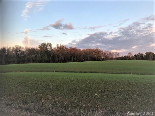 1221 A McIntyre Road Wingate, NC 28174 - Photo 23 of 25 a view of a green field