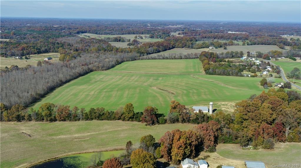 1221 A McIntyre Road Wingate, NC 28174 - Photo 4 of 25 a view of a field with an ocean