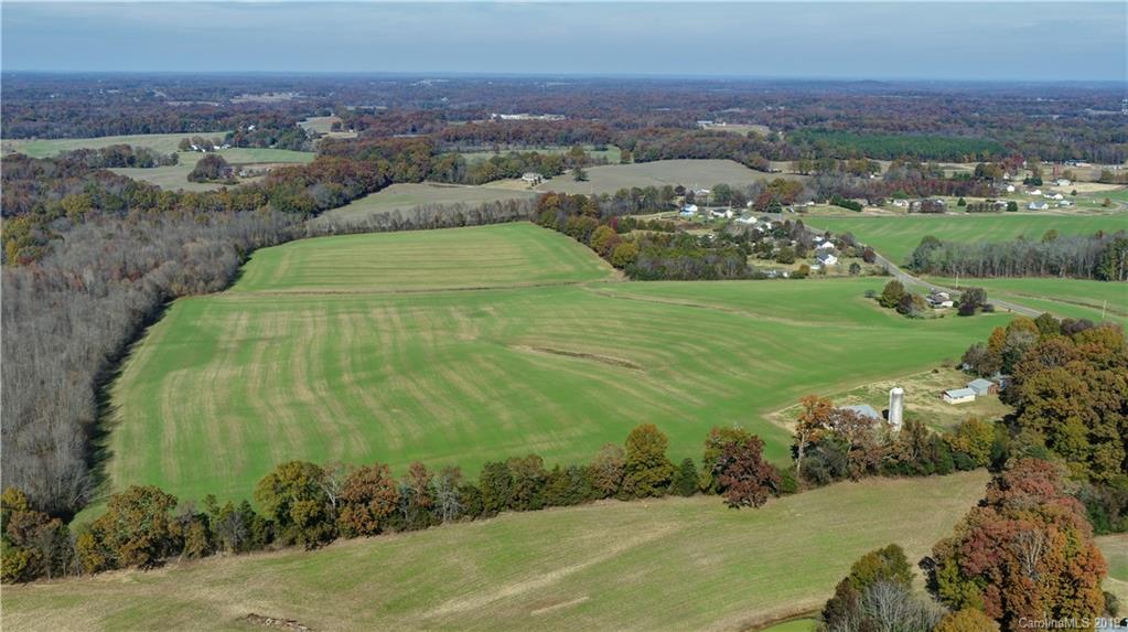 1221 A McIntyre Road Wingate, NC 28174 - Photo 5 of 25 an aerial view of a houses