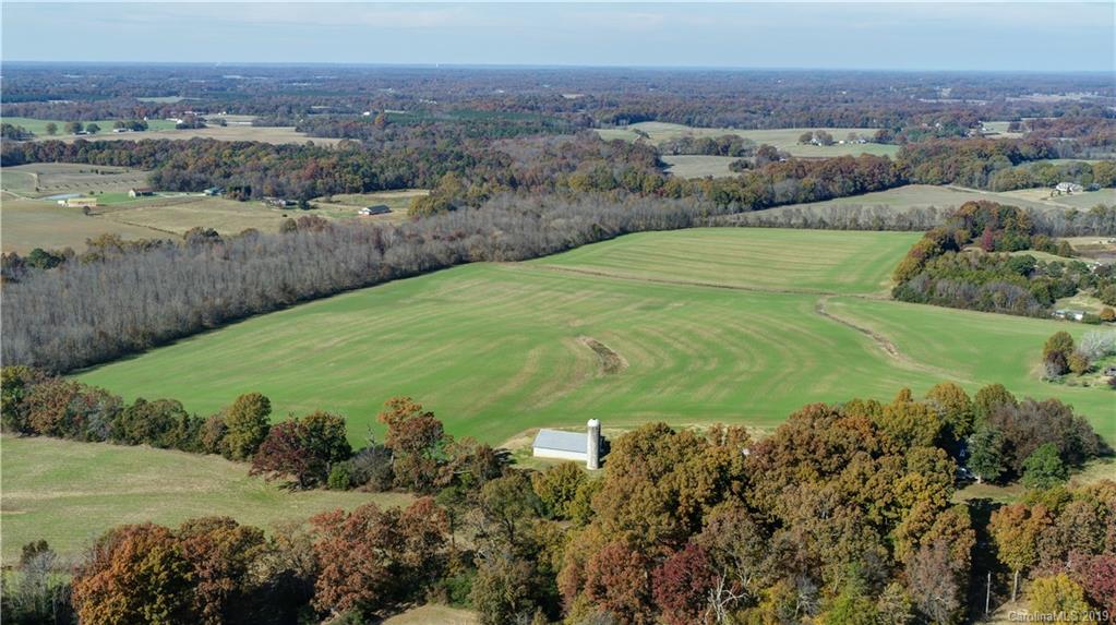 1221 A McIntyre Road Wingate, NC 28174 - Photo 8 of 25 a view of a field with an ocean