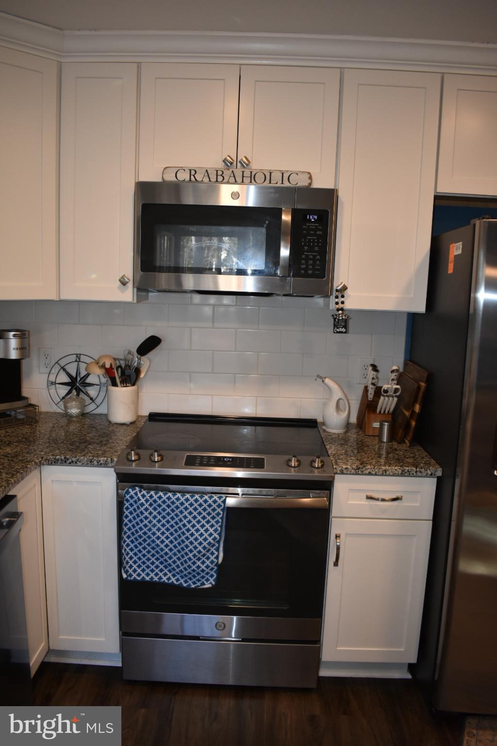 5744 Johns Way Tilghman, MD 21671 - Photo 19 of 41 Modern kitchen with sleek appliances.