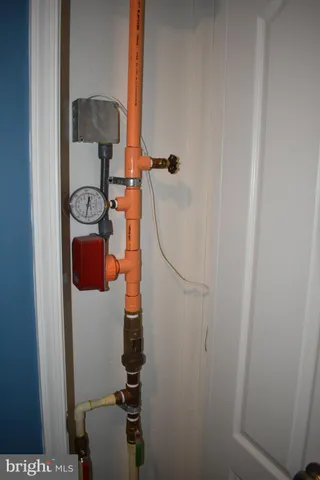 a view of a house with snow on the wall