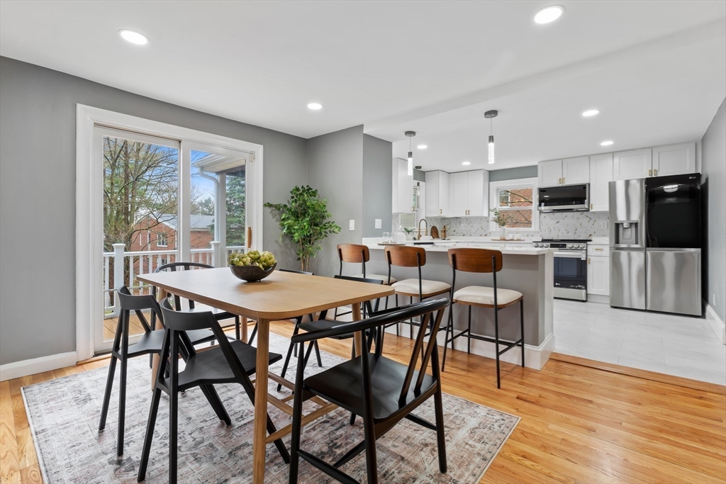 25 Parker Street Newton, MA 02459 - Photo 14 of 38 a view of a dining room with furniture window and wooden floor