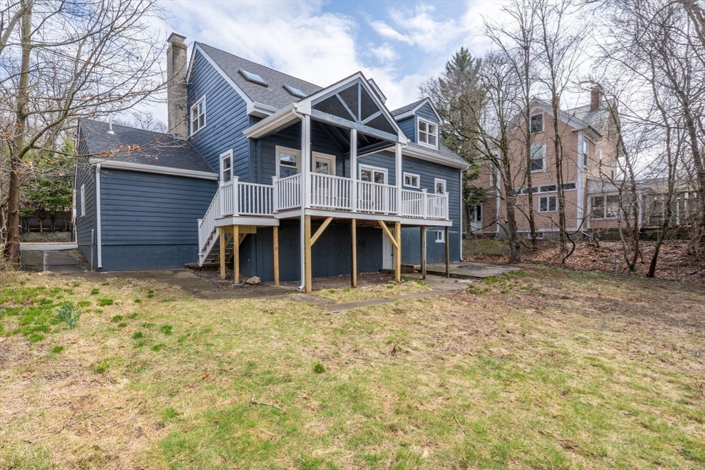 25 Parker Street Newton, MA 02459 - Photo 37 of 38 a front view of a house with a yard