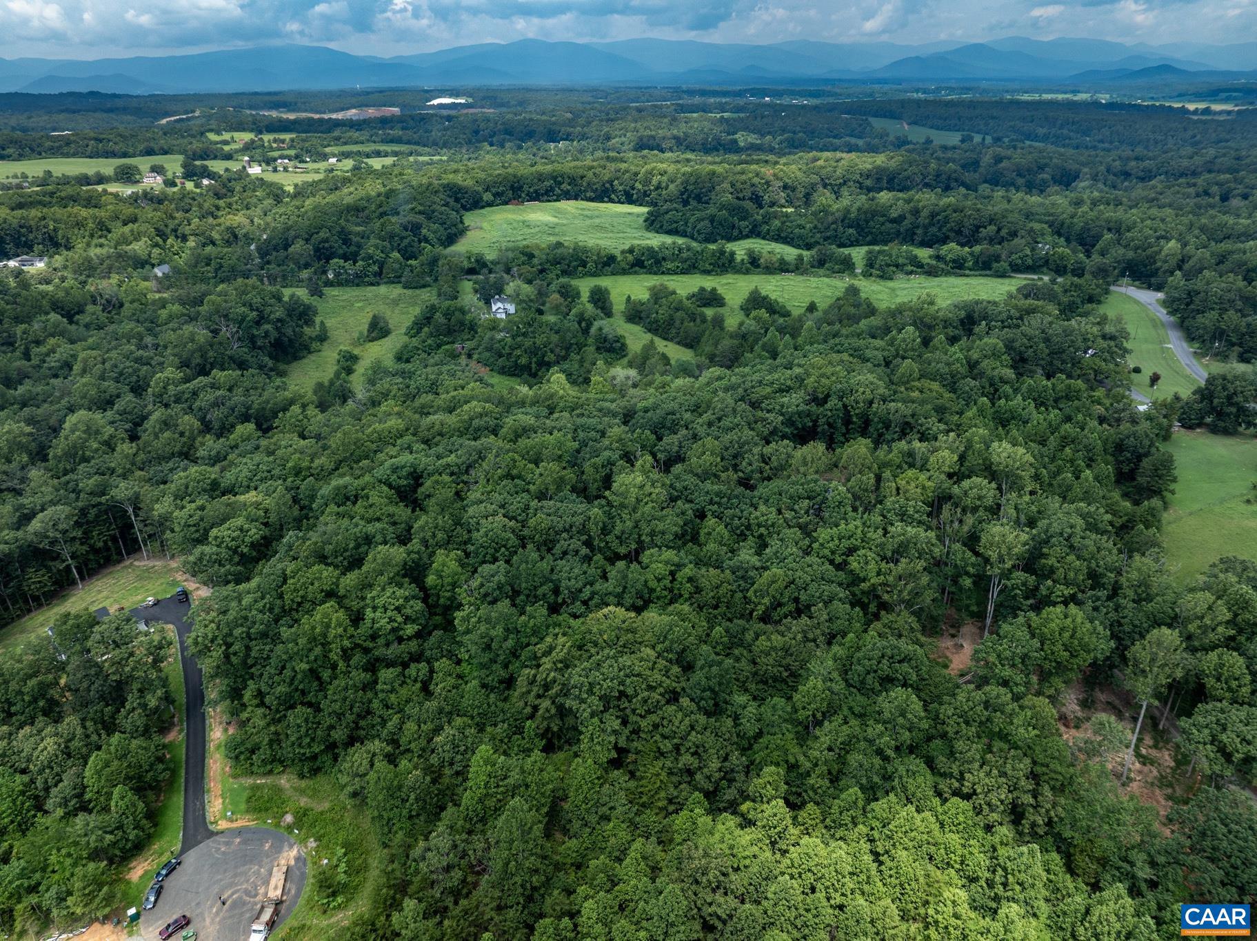 Lot 69 Palmer Place, Unit 69 Ruckersville, VA 22968 - Photo 1 of 15 an aerial view of a house with a yard