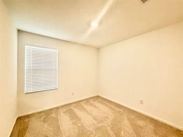 a view of a room with a window