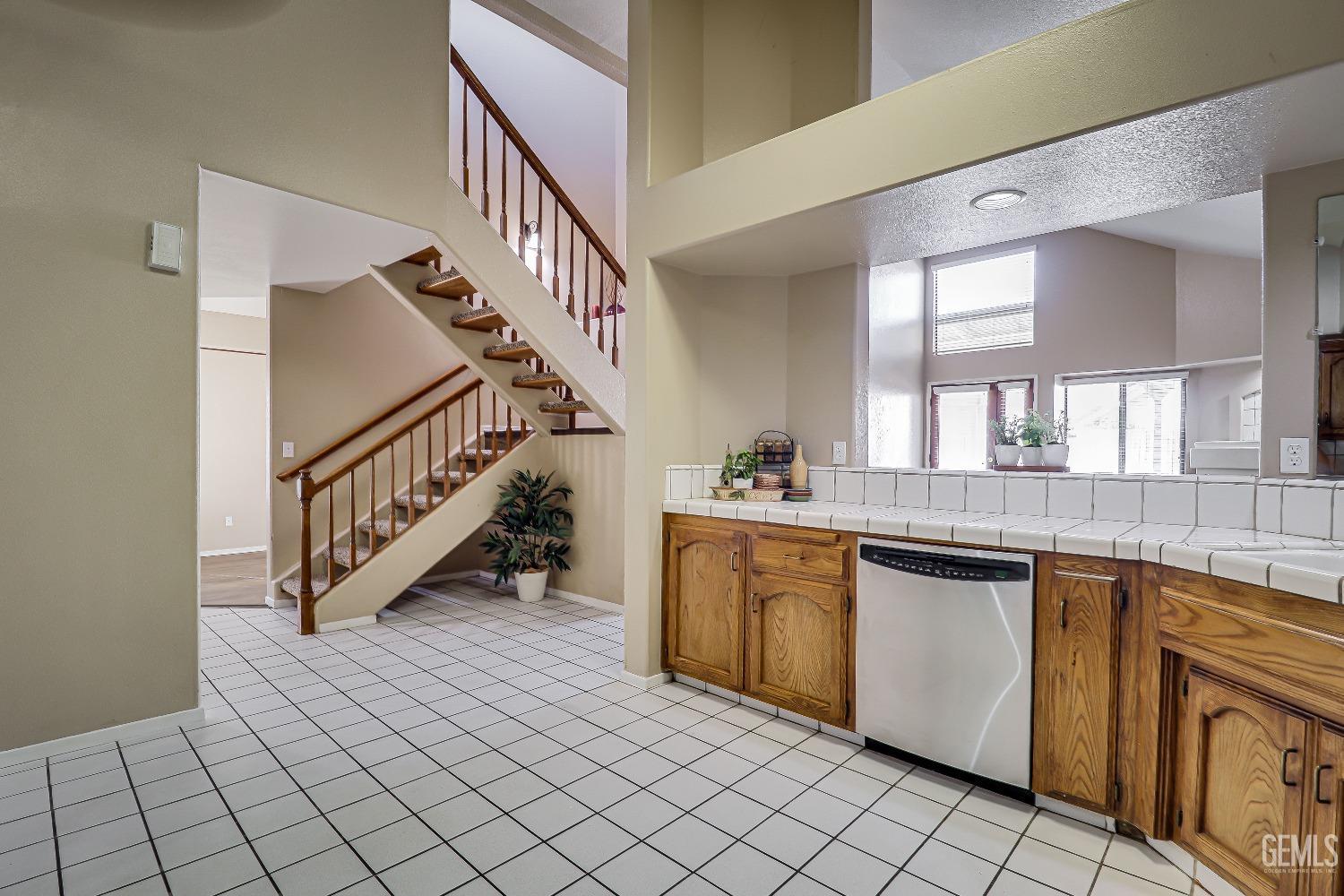 Undisclosed Address Bakersfield, CA 93311 - Photo 13 of 51 a room with lots of white furniture and a sink