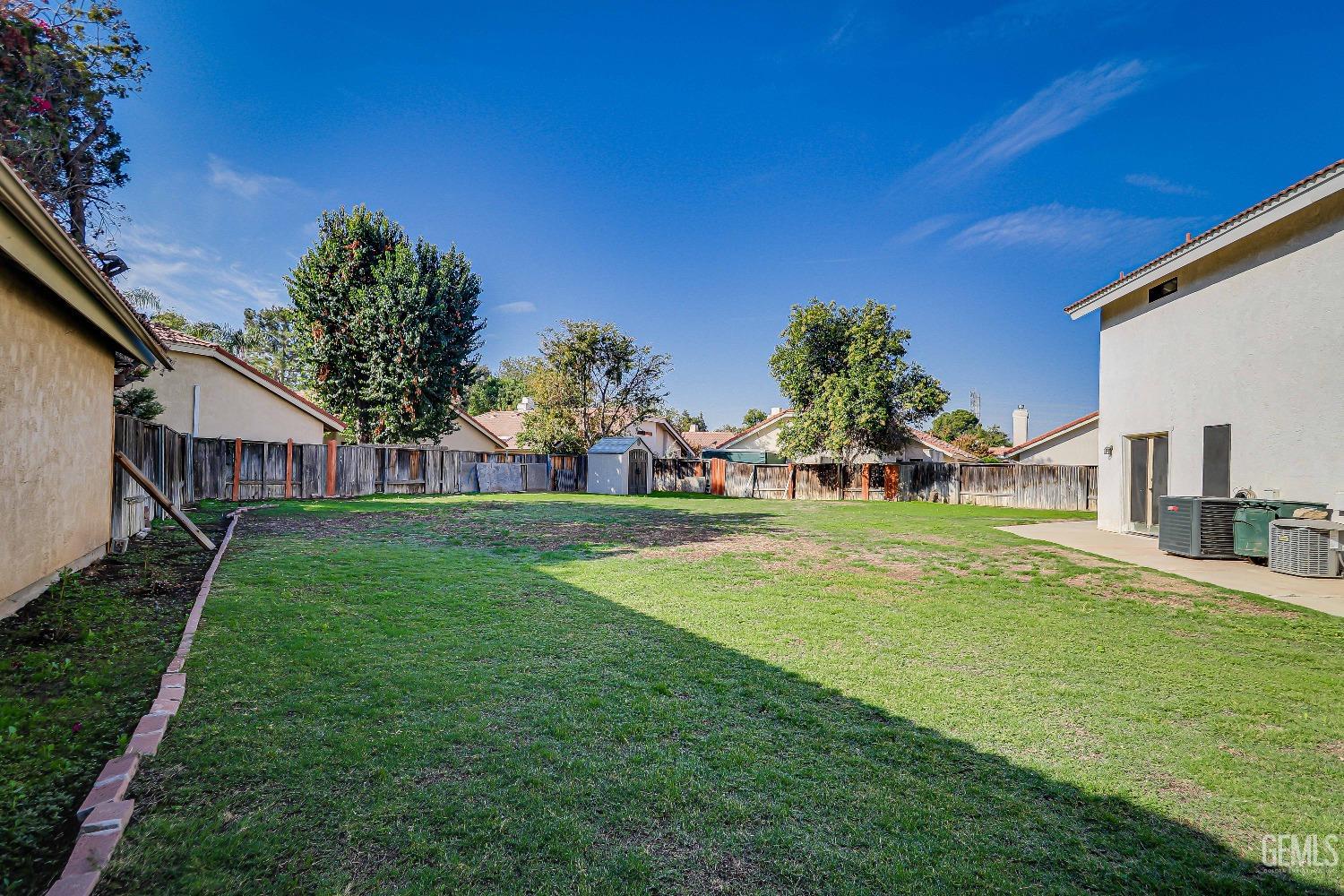 Undisclosed Address Bakersfield, CA 93311 - Photo 43 of 51 a view of a house with a big yard