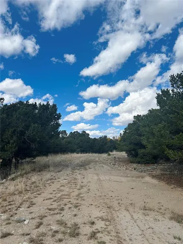 a view of a lake with a yard