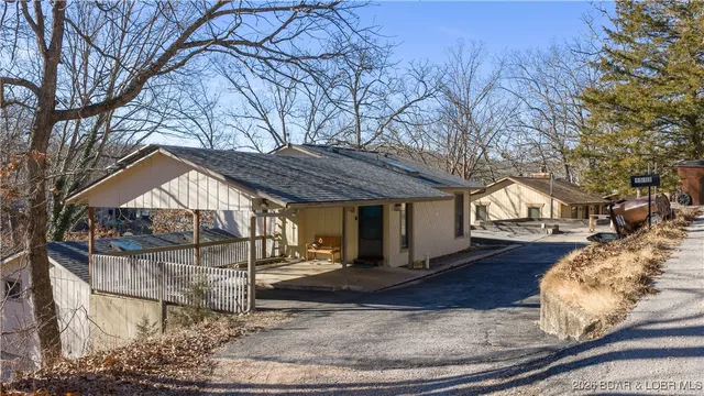 $560,000 | 1513 Lake Road 54-64, Osage Beach, MO 65065