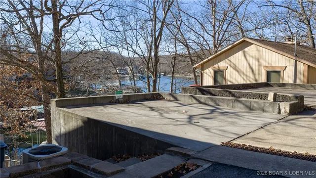 $560,000 | 1513 Lake Road 54-64, Osage Beach, MO 65065