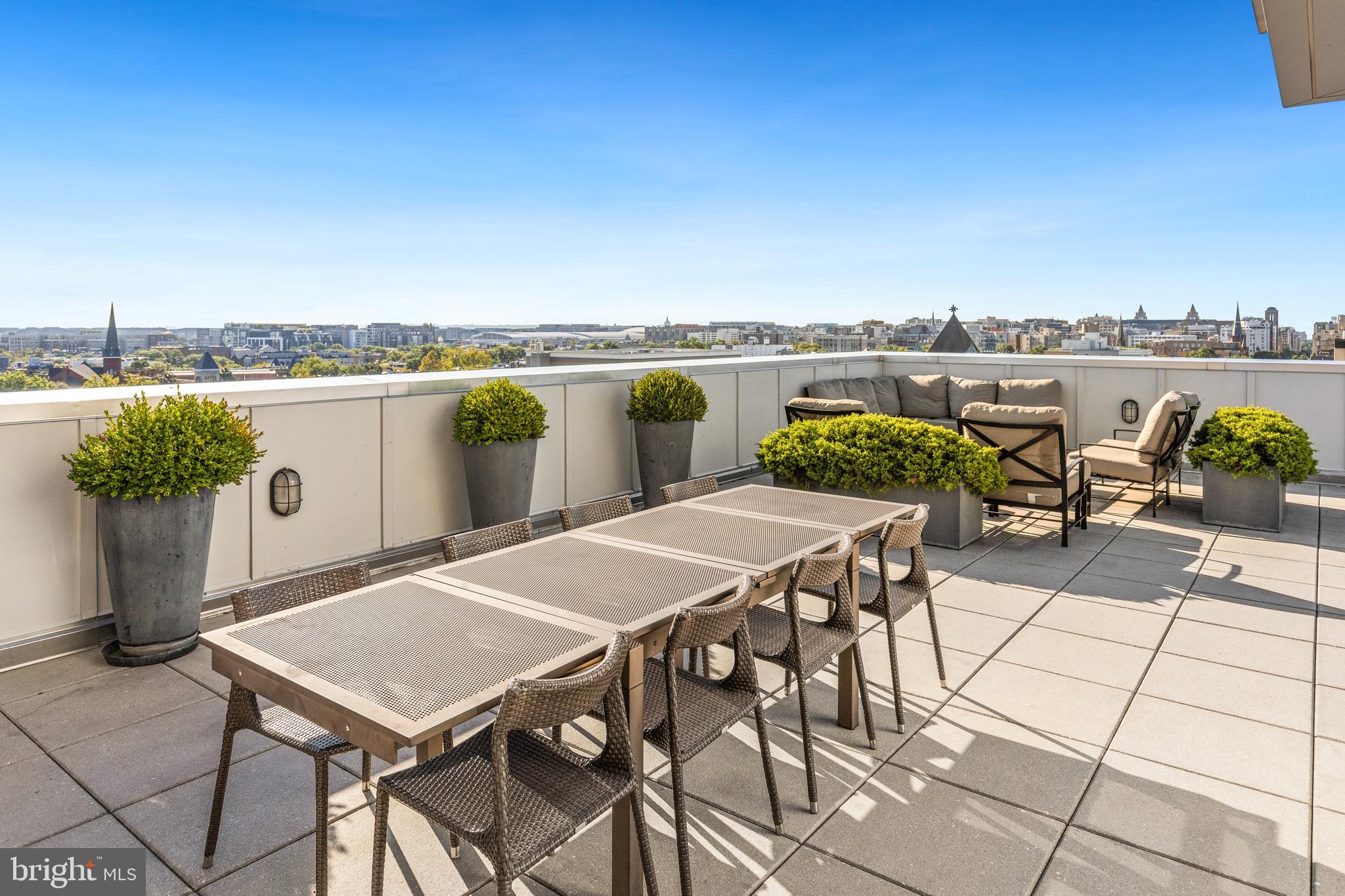 1401 R Street Northwest, Unit 206 Washington, DC 20009 - Photo 15 of 23 a view of a terrace with furniture and stove