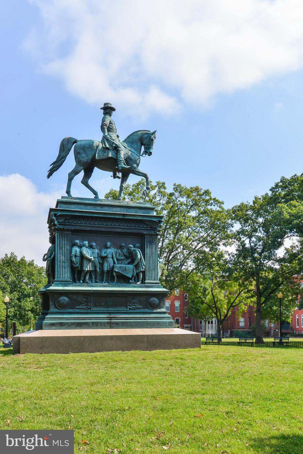 1401 R Street Northwest, Unit 206 Washington, DC 20009 - Photo 23 of 23 a front view of a house with a garden