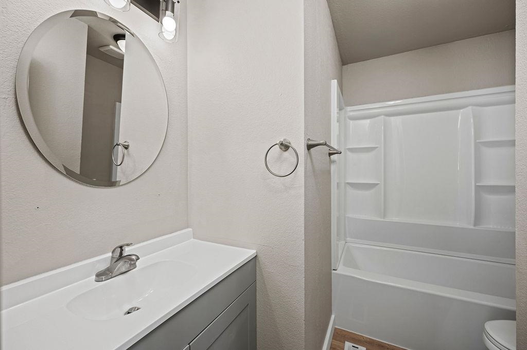 508 Rosa Street Palisade, CO 81526 - Photo 11 of 18 a bathroom with a sink a toilet and shower