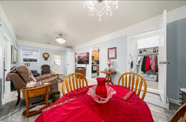 a kitchen with stainless steel appliances granite countertop a stove and a sink