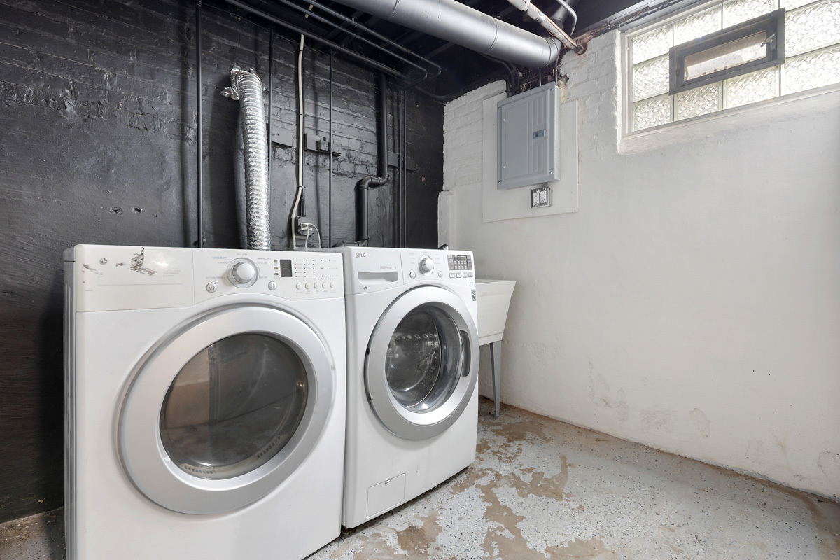 12511 South State Street Chicago, IL 60628 - Photo 22 of 26 a utility room with dryer and washer