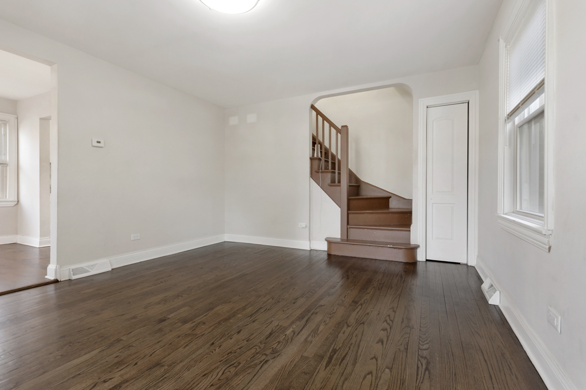 12511 South State Street Chicago, IL 60628 - Photo 6 of 26 a view of entryway with wooden floor