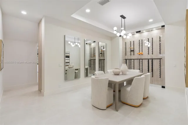 a bathroom with a sink toilet a mirror and shower