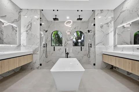 a living room with furniture and white walls