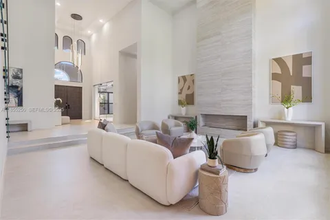 a kitchen with a stove a sink and a refrigerator