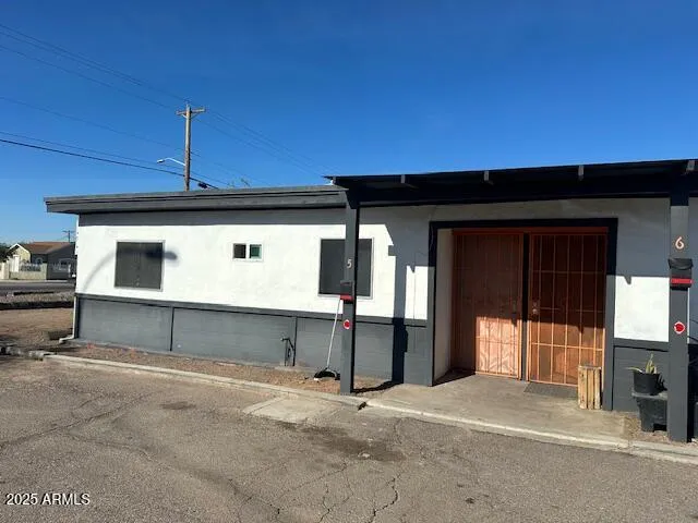 a front view of a house with a garage