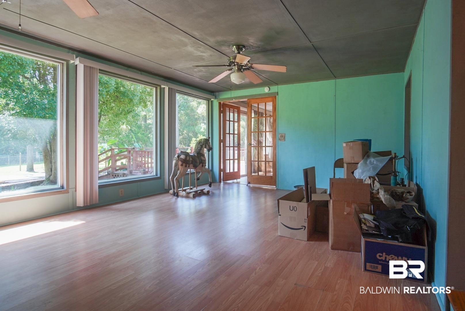 9190 County Road 97 Elberta, AL 36530 - Photo 37 of 53 Misc room featuring plenty of natural light, ceiling fan, and hardwood / wood-style flooring