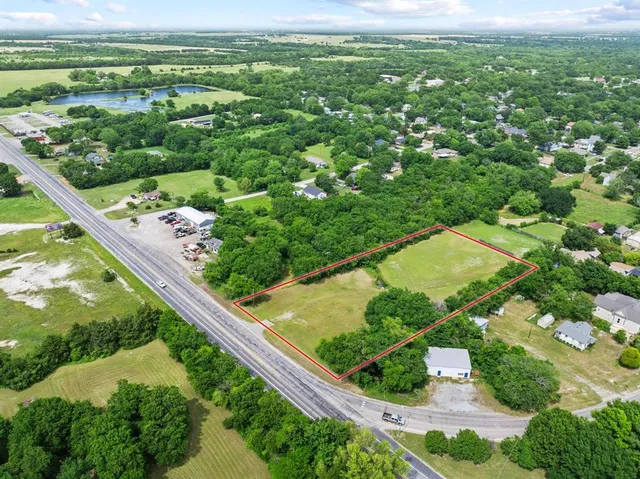 a view of a garden from a balcony