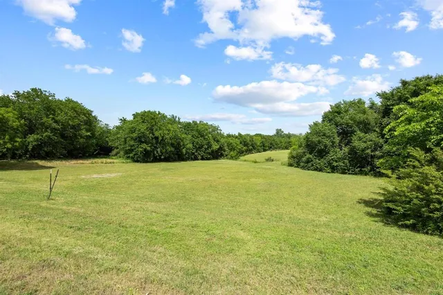 a view of outdoor space and yard