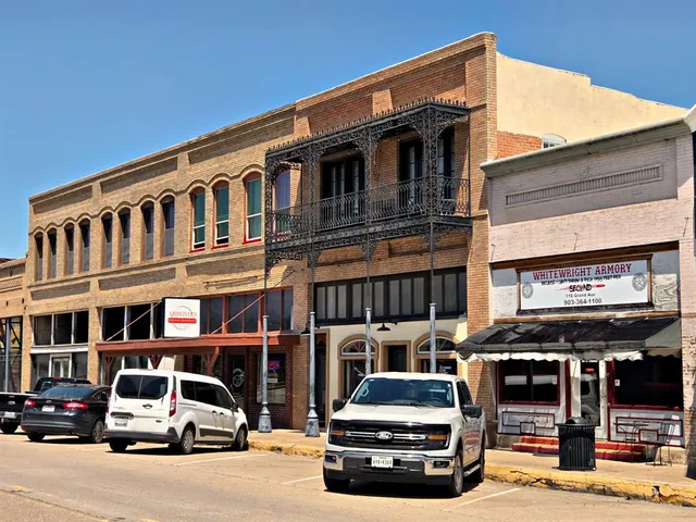 a car parked in front of a building