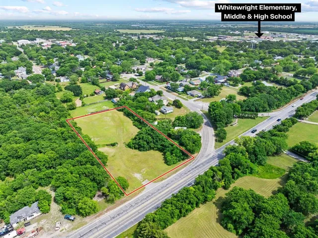 a view of a city street from a building