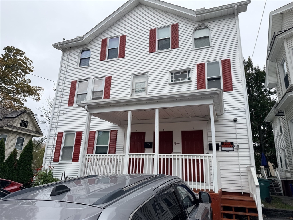 15 Mechanic Street, Unit 2 Attleboro, MA 02703 - Photo 15 of 15 a front view of a house with a porch