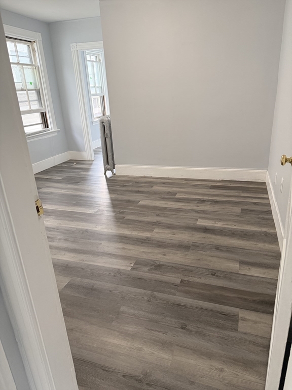 15 Mechanic Street, Unit 2 Attleboro, MA 02703 - Photo 7 of 15 a view of wooden floor and windows in a room