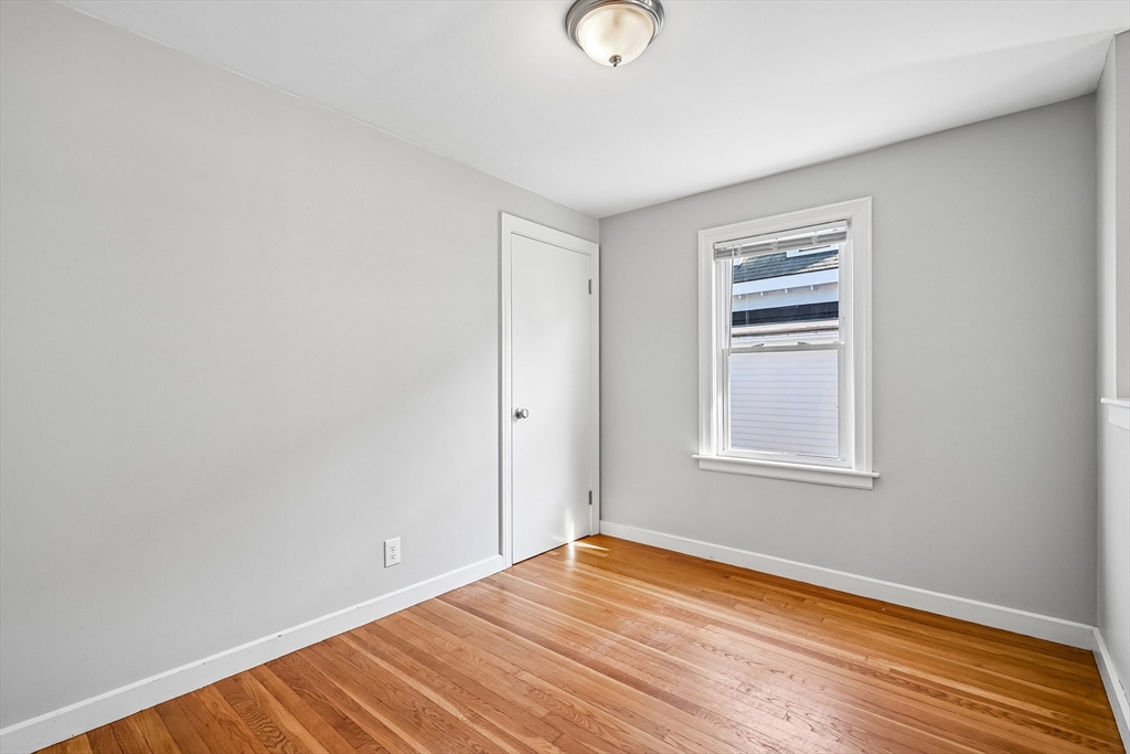 42 East Main Street Gloucester, MA 01930 - Photo 9 of 25 a view of empty room with wooden floor