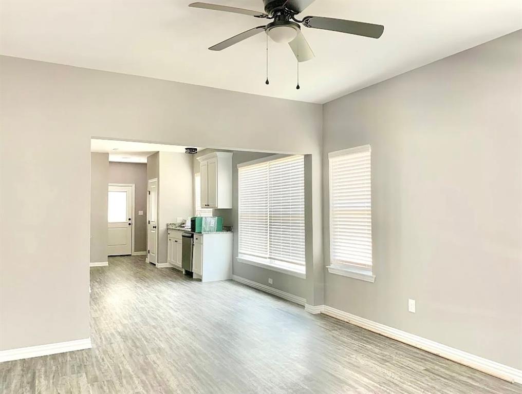312 North Elliott Avenue Sherman, TX 75092 - Photo 2 of 10 a view of an empty room with a window