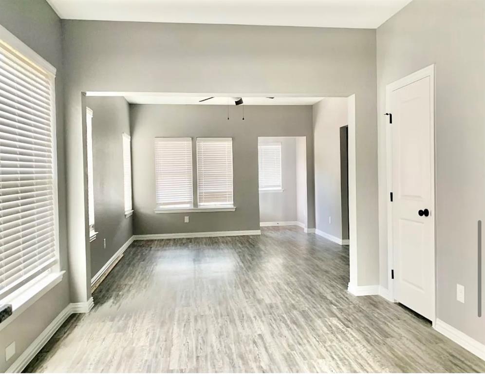 312 North Elliott Avenue Sherman, TX 75092 - Photo 5 of 10 a view of an empty room and glass door