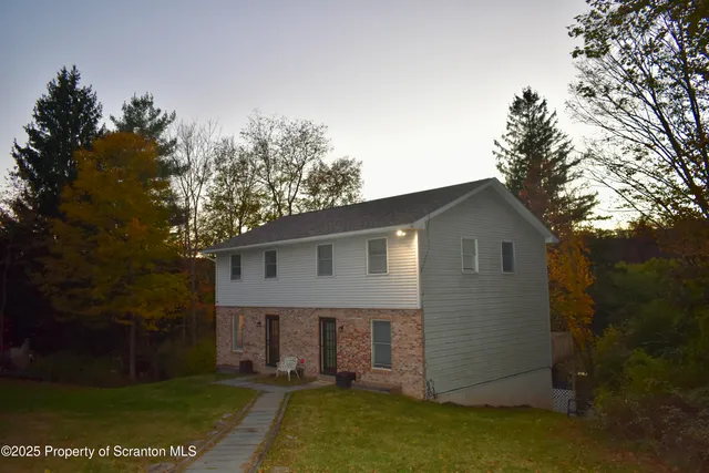 front view of house with a yard