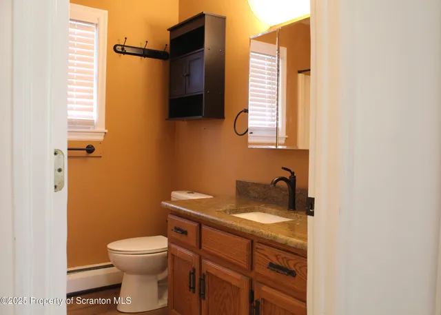 a bathroom with a sink and a toilet