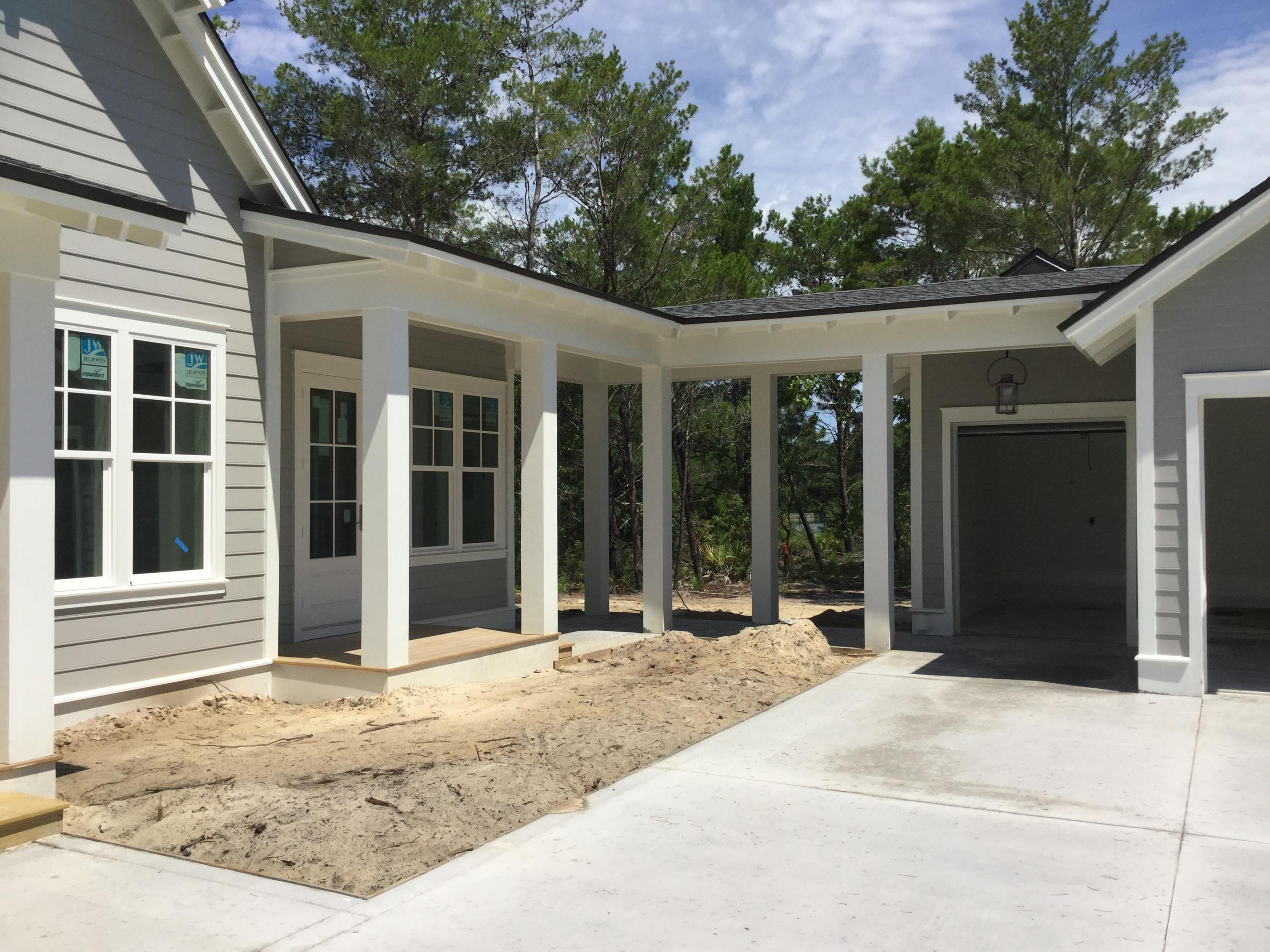 237 Splash Drive, Unit LOT 195) Inlet Beach, FL 32461 - Photo 3 of 5 a house with a garden view