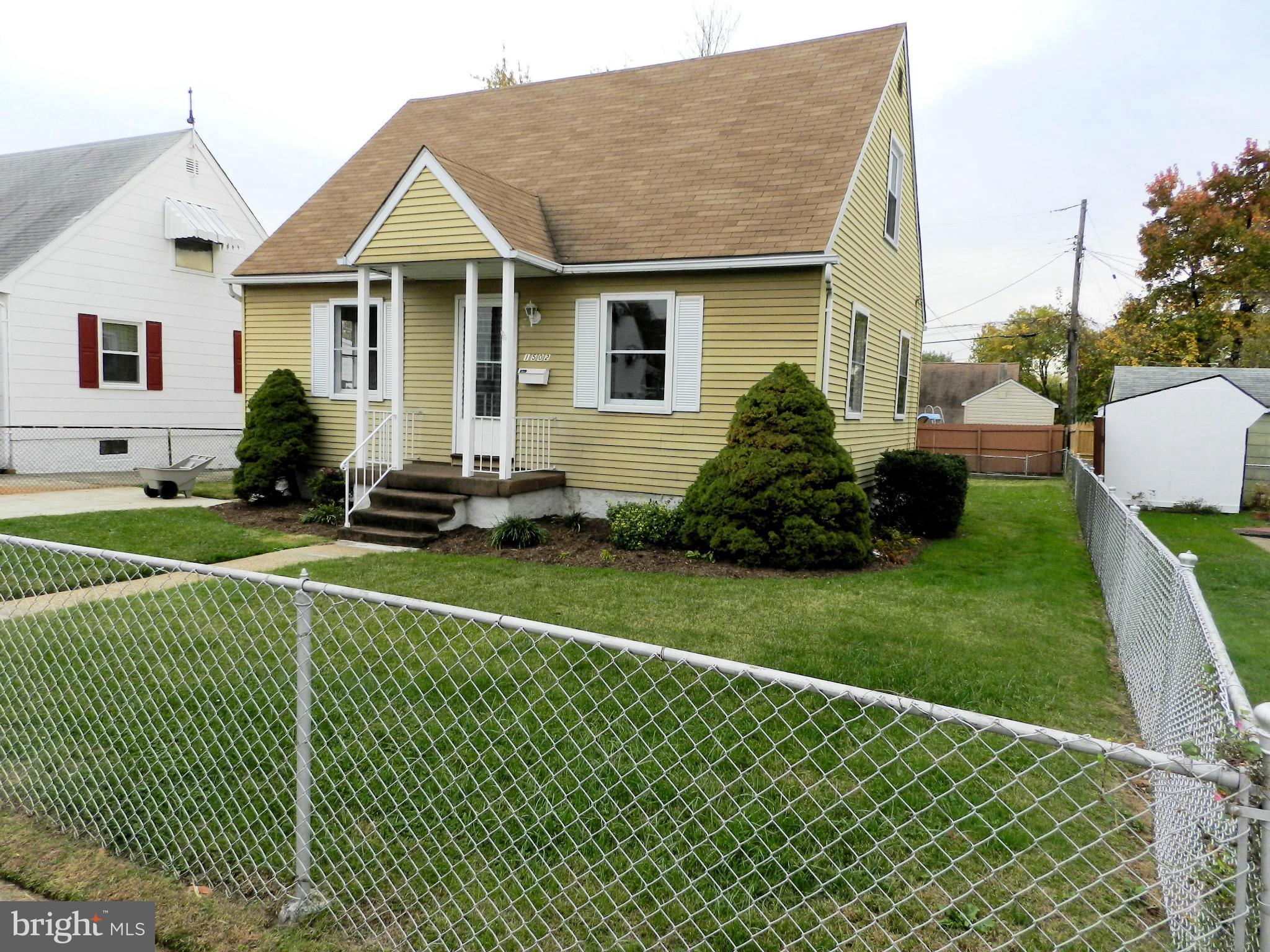 1502 Rita Road Dundalk, MD 21222 - Photo 20 of 21 a front view of a house with a garden