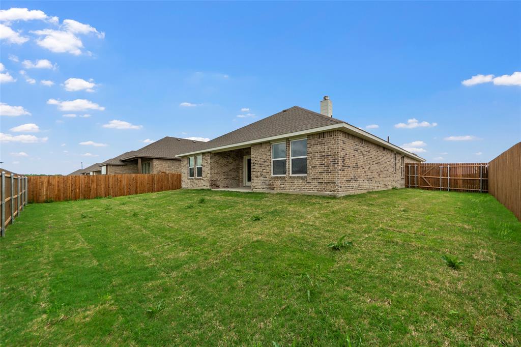 210 Pennington Road Josephine, TX 75173 - Photo 19 of 23 a front view of house with yard and green space