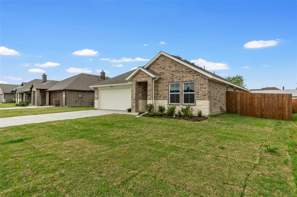 210 Pennington Road Josephine, TX 75173 - Photo 2 of 23 a view of a house with a big yard