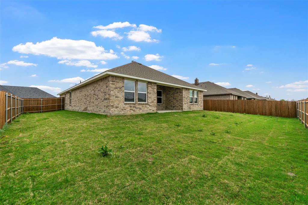 210 Pennington Road Josephine, TX 75173 - Photo 21 of 23 a view of a house with a yard