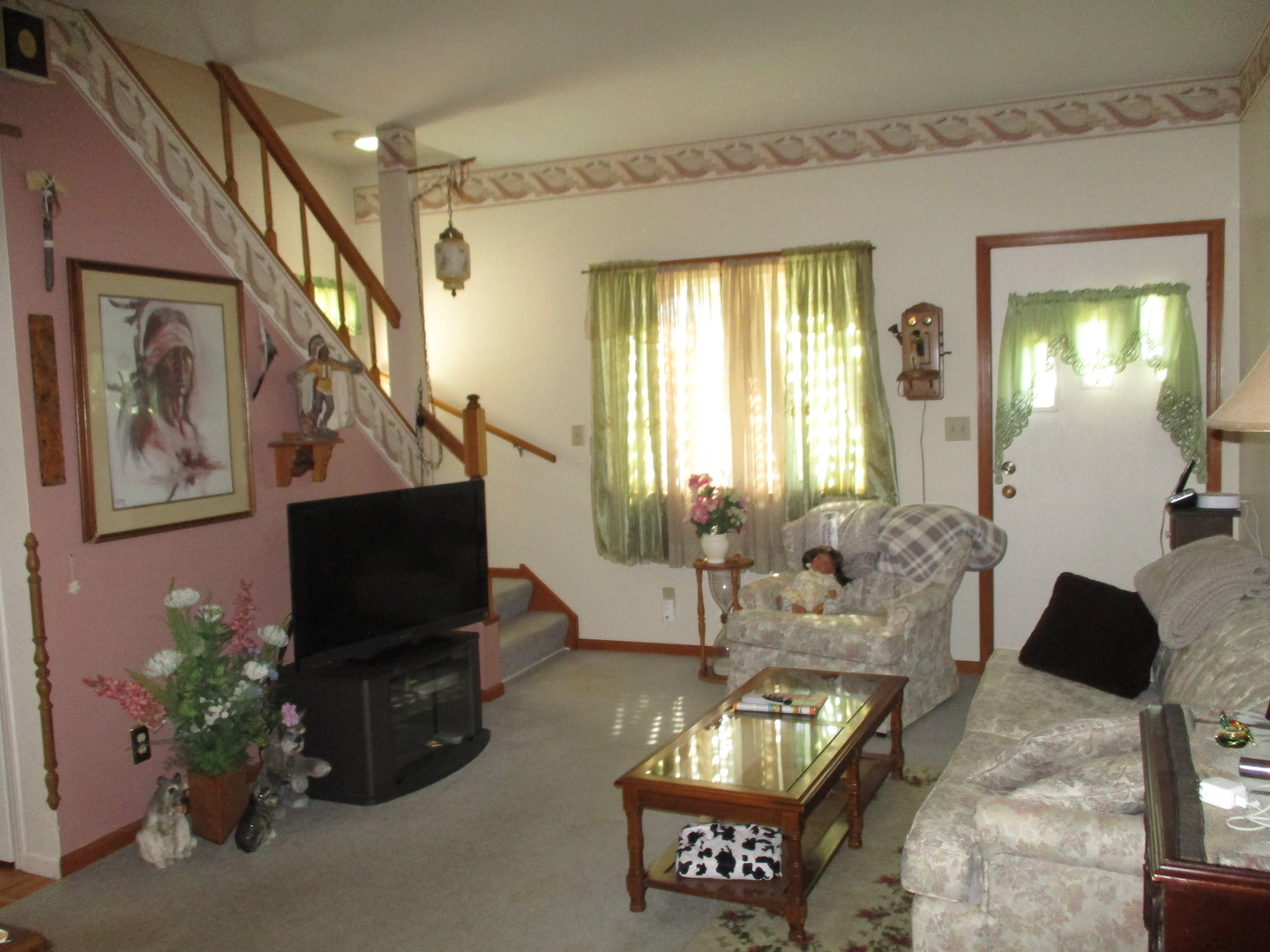 3299 East 1951st Road Ottawa, IL 61350 - Photo 7 of 19 a living room with furniture and a flat screen tv
