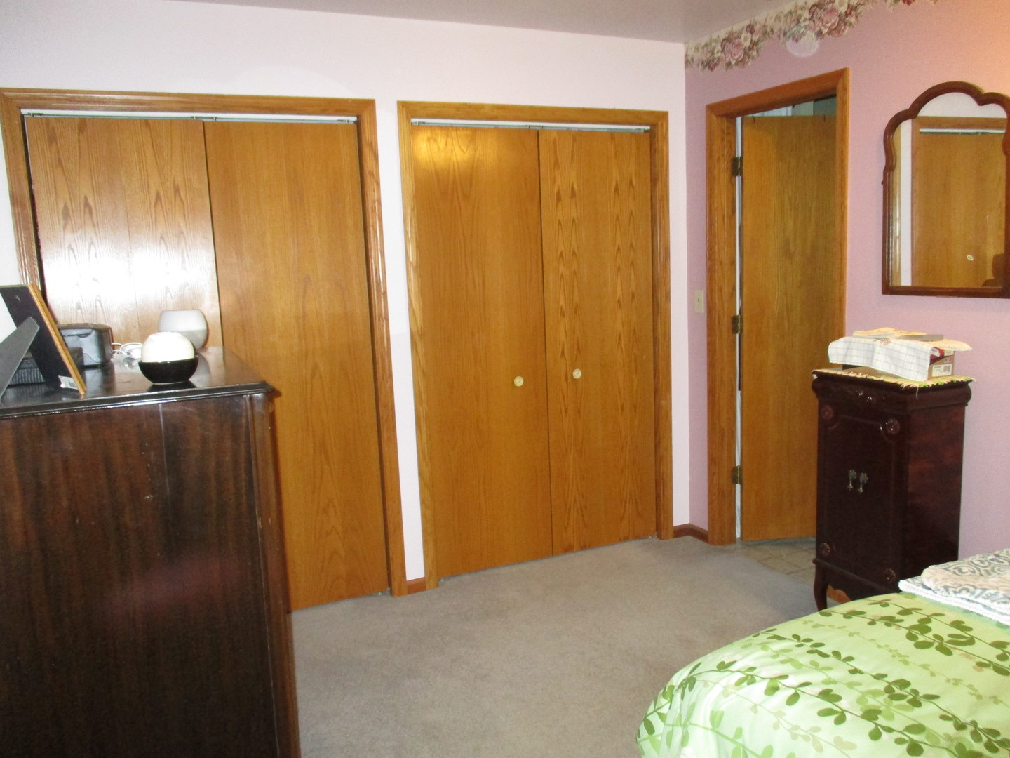 3299 East 1951st Road Ottawa, IL 61350 - Photo 9 of 19 a bedroom with a bed and a dresser