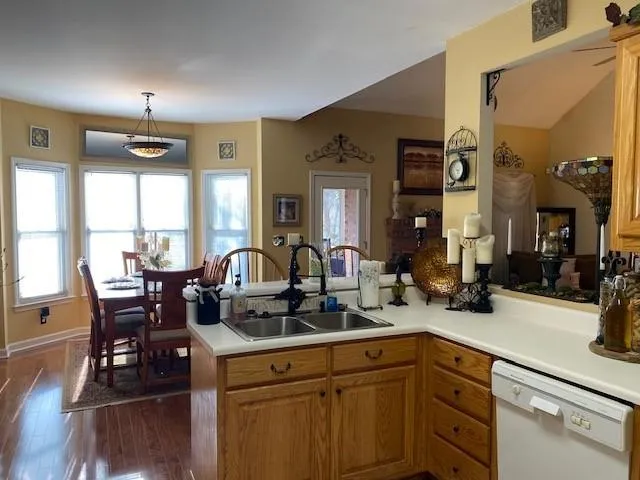a kitchen with a sink and cabinets